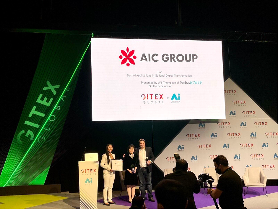 AICGroup Award recognition on stage