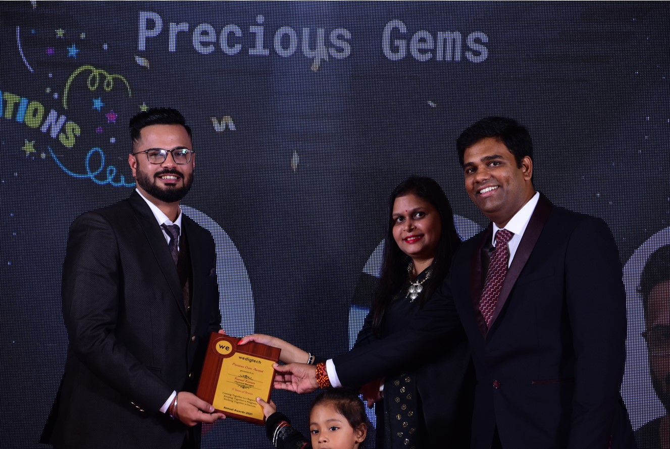 WeDigTech Precious Gems Award being Presented to Technical Lead Kamal Kumar